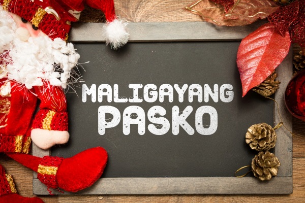 Chalkboard with "MALIGAYANG PASKO" (Merry Christmas in Tagalog) written in white.