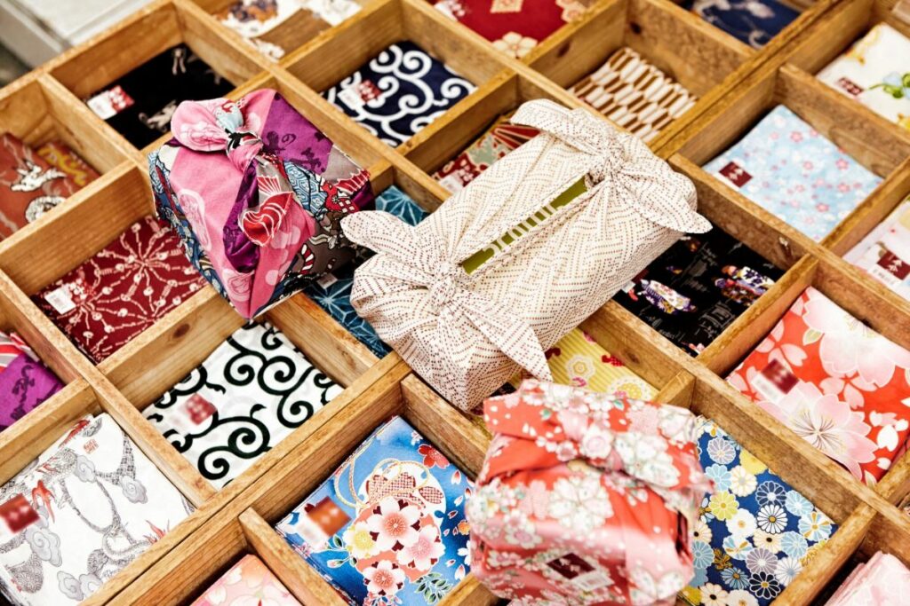 Japanese souvenirs omiyage in a store, colourful small Japanese gifts.